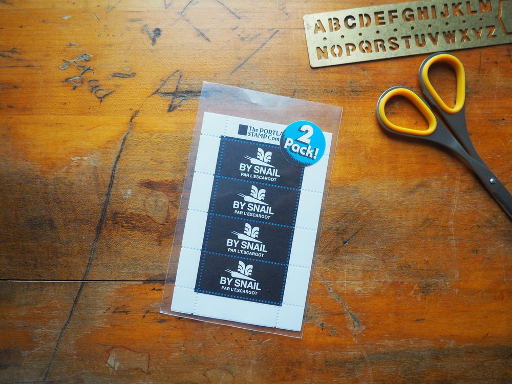 The Portland Stamp Company - Lick & Stick Stamps - By Snail - Black & Blue (2-pack)